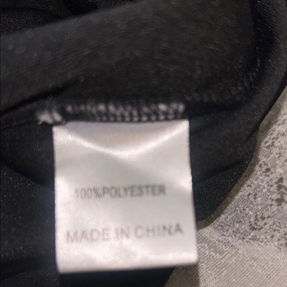 Elegant Black Dress with Floral Accents - Picture 12 of 13